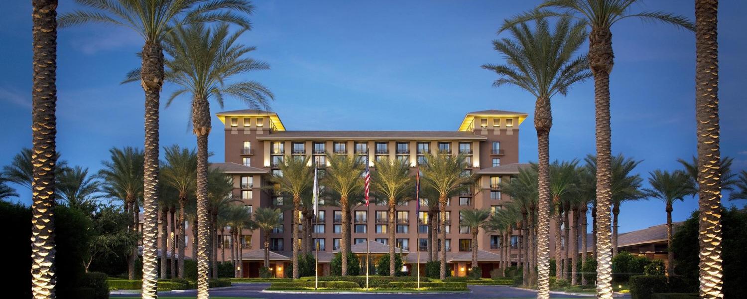 Palm-lined entrance to The Westin Kierland Resort and Spa at dusk