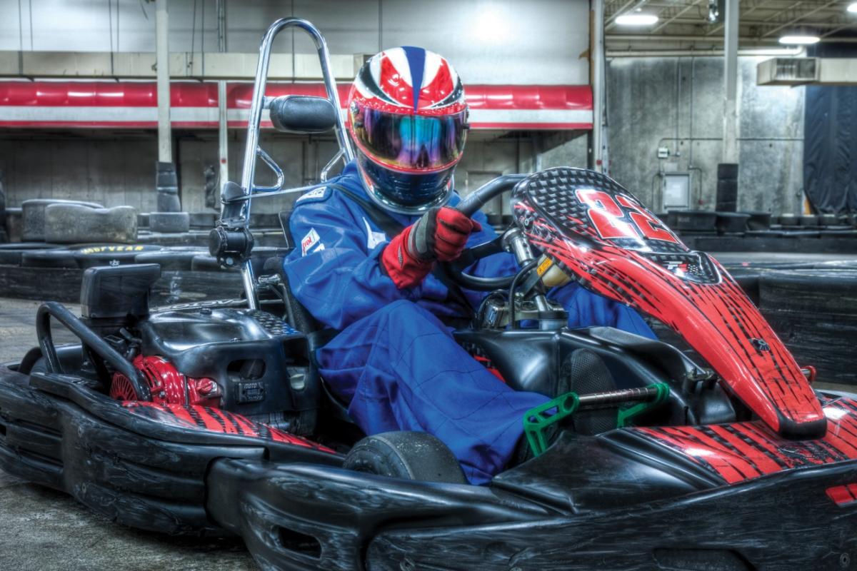 Teens racing karts at Octane Raceway