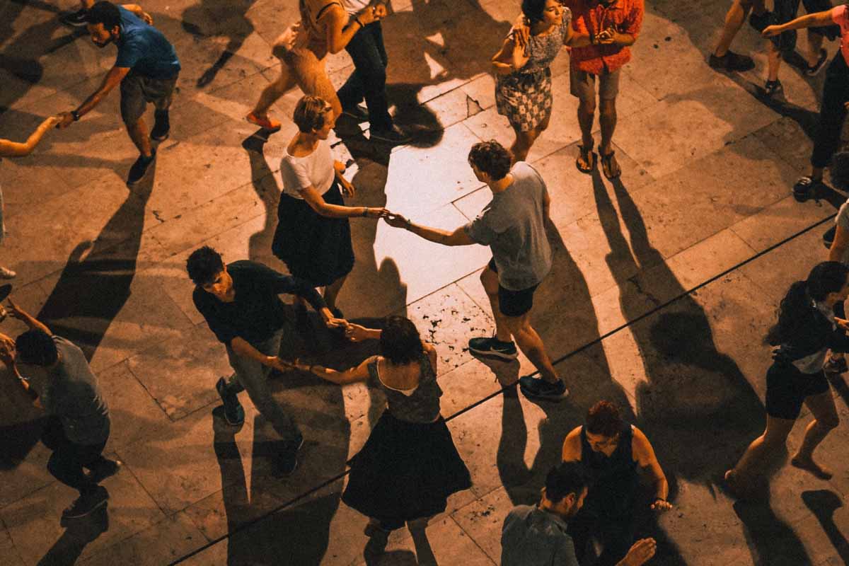 Group of people line dancing