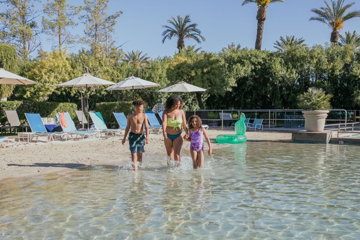 Family enjoying pool at Hyatt Regency Scottsdale Resort