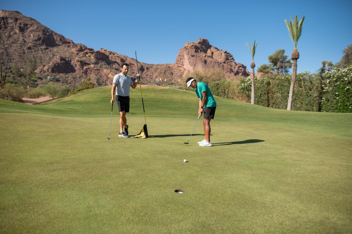 Golfers Putting on the Short Course at Mountain Shadows Scottsdale