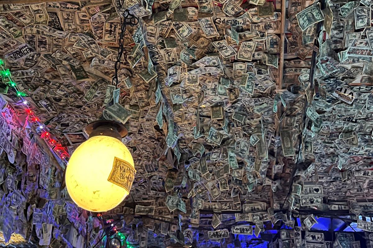 Dollars covering walls at Pattie's First Avenue bar in Scottsdale