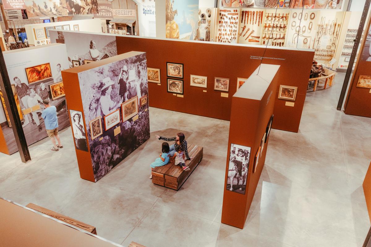 A family enjoying the exhibits at Western Spirit: Scottsdale's Museum of the West in Old Town.